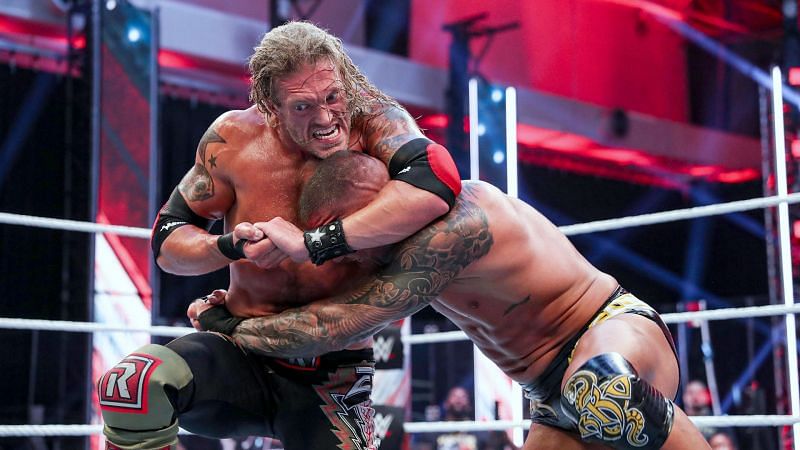 The Rated-R Superstar headlocks Randy Orton during the